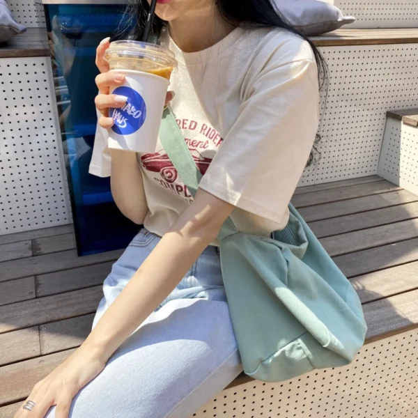 b30a7174ea5407d435e5dde254632b22.webp Korean Version of the New Large-capacity Messenger Bag