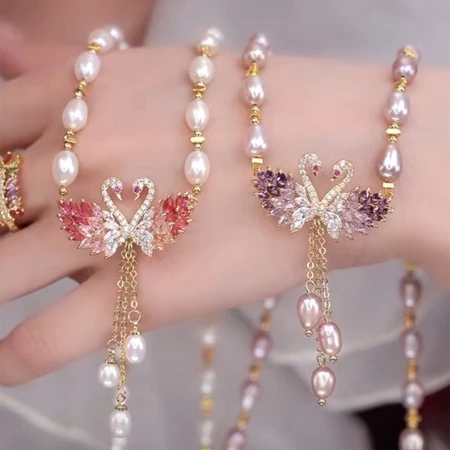 sg-11134201-7qvdj-lkb32rno2szga8@resize_w450_nl.webp Swan Necklace Female Pearl Pendant Clavicle Chain